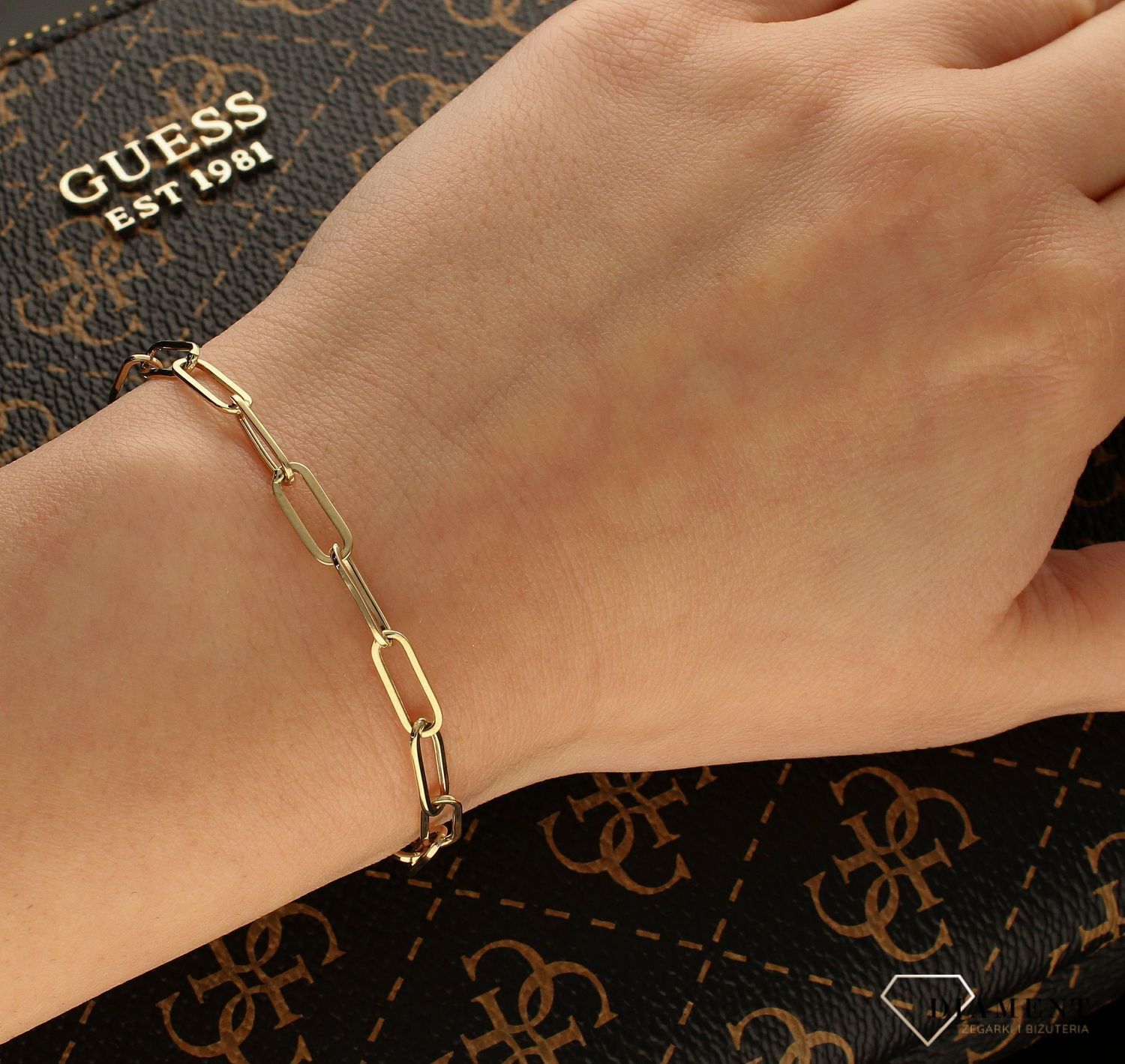 Złota bransoletka złożona ze splecionych owalnych ogniw BR 5316C (1).jpg